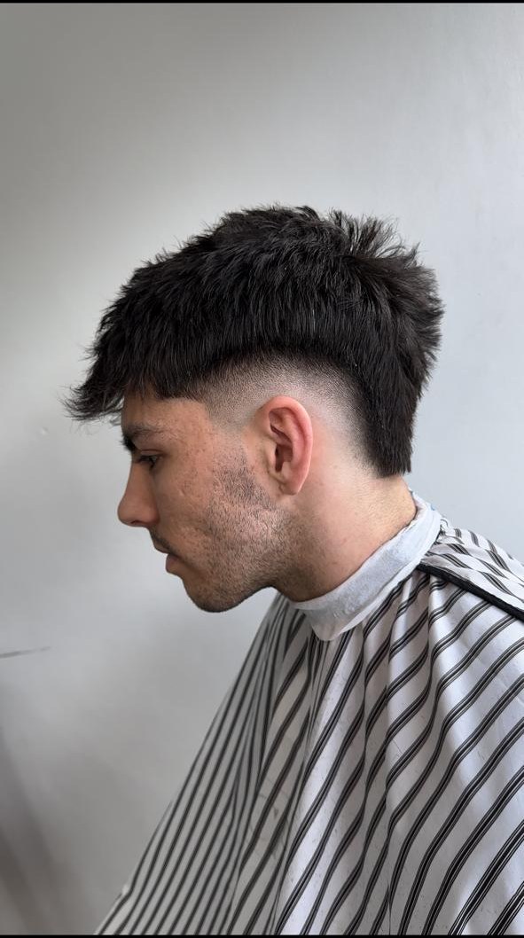 Mullet texturizado con mid fade